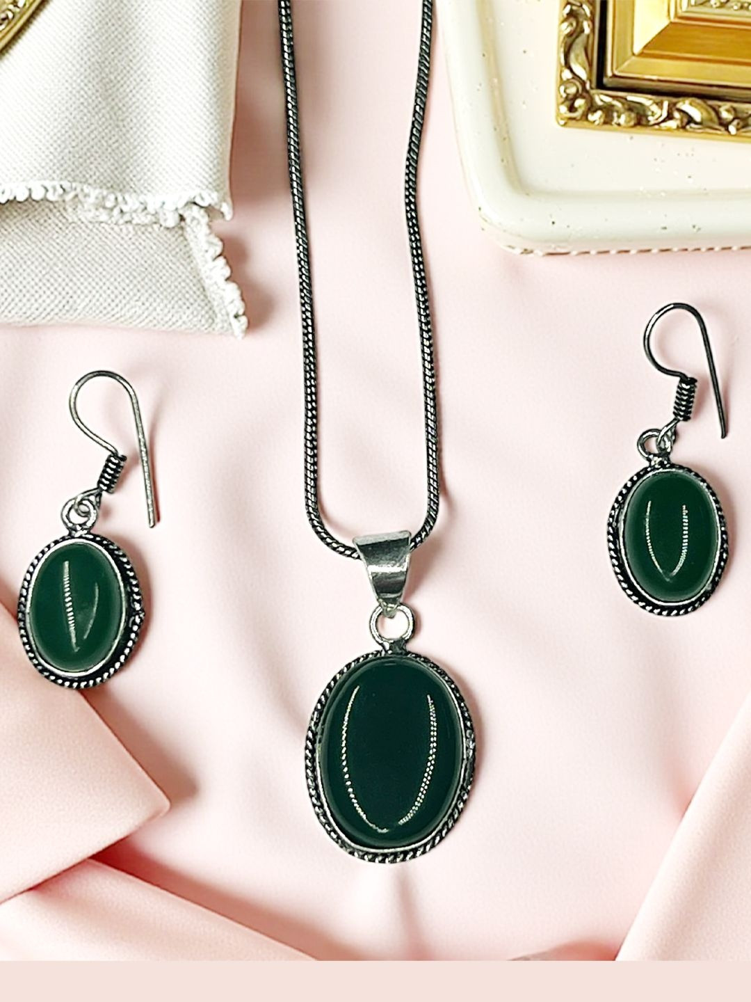 The Style Courtyard Artificial Stone-Studded Oxidised Oval Shaped Pendant And Earrings