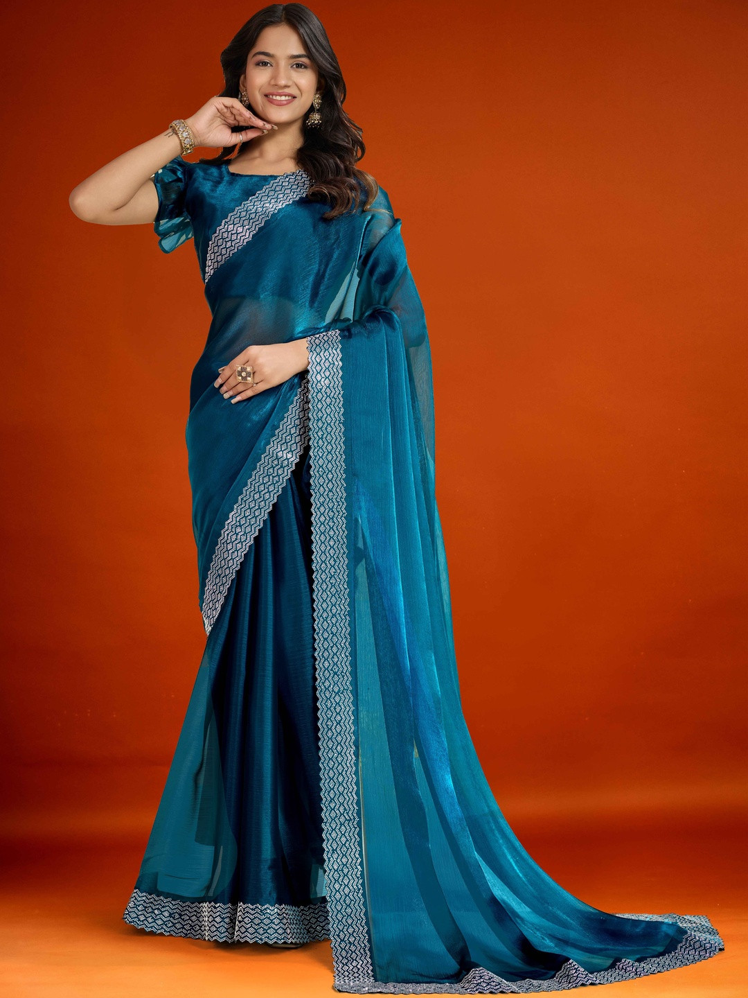Women Woven Graceful Shimmer Saree with Embellished Edgings Silk Blend Saree