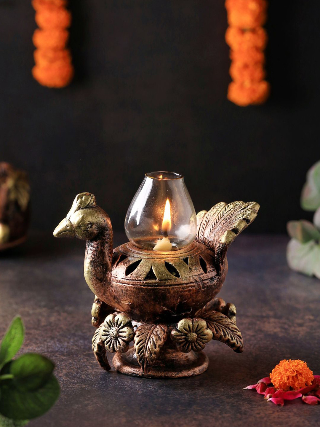 The handicraftian Bronze-Coloured Peacock Akand DesignedDiya