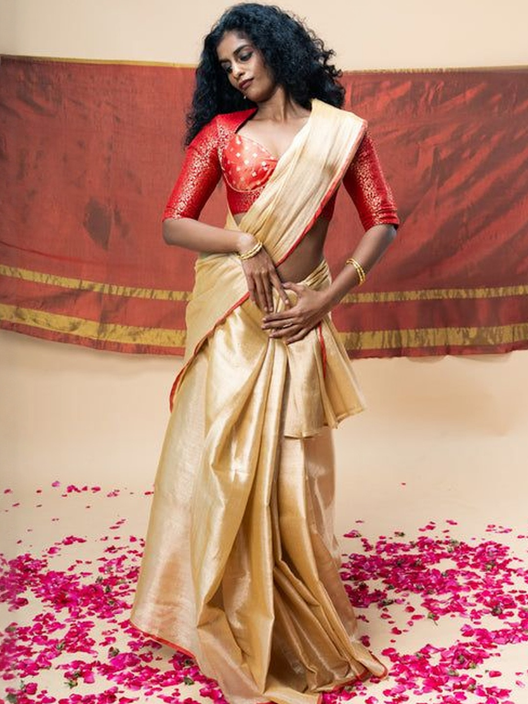 HUTS AND LOOMS MRIGVI I Rose Gold Handwoven Tissue Saree With Red Border