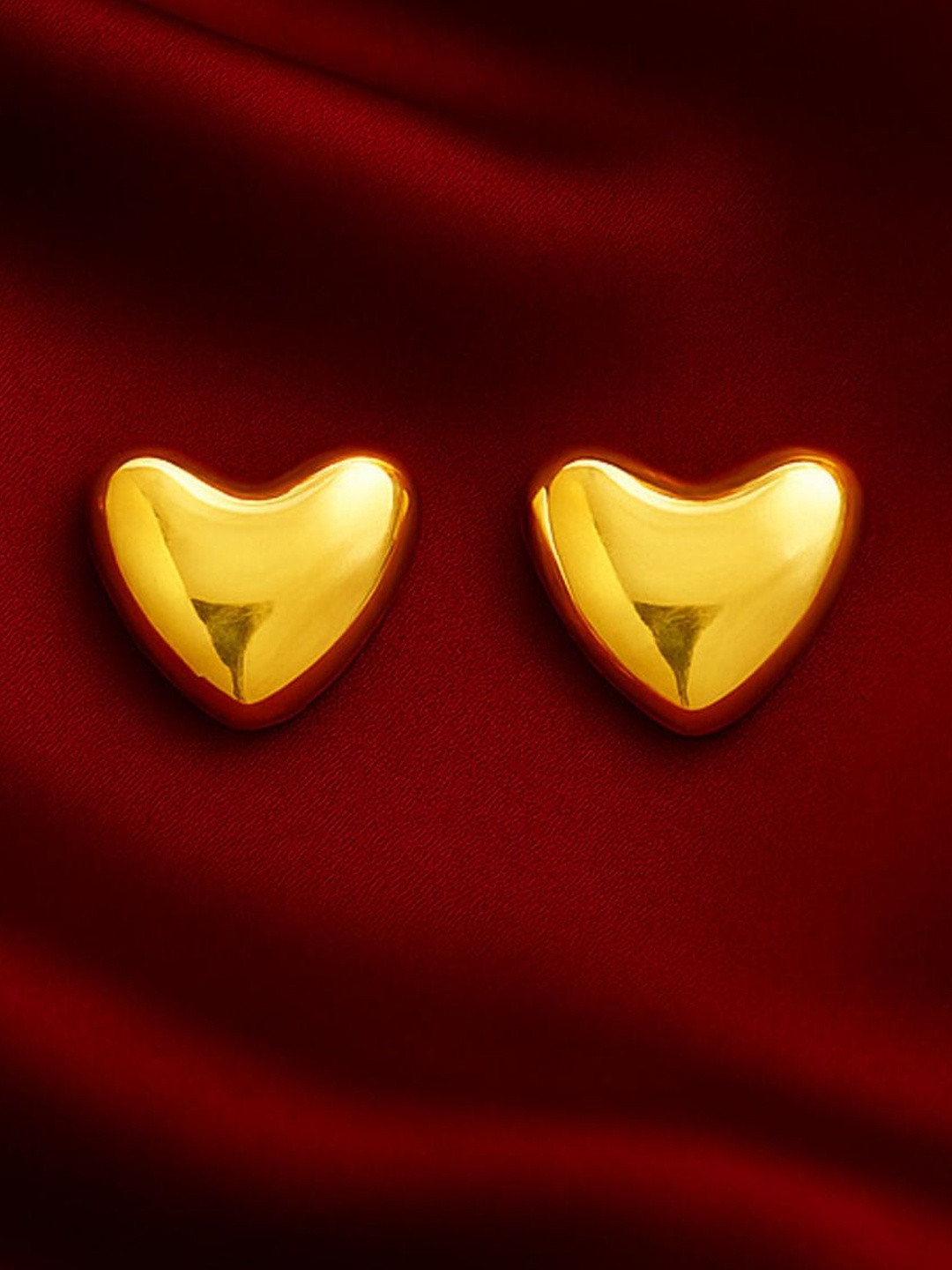 ISHTAARA Women Gold Stainless steel Gold-Pleated Heart Shaped Studs Earrings