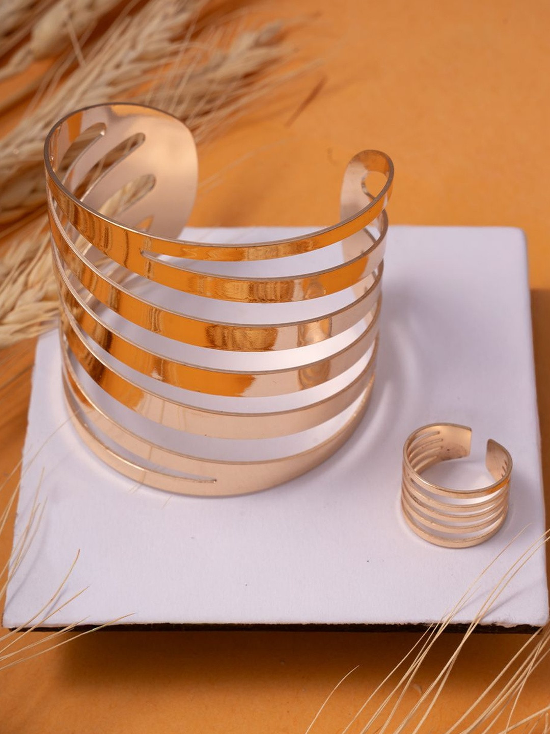 Ashnera Women Gold-Plated Striking Stainless Steel Cuff Bracelet & Matching Ring Set