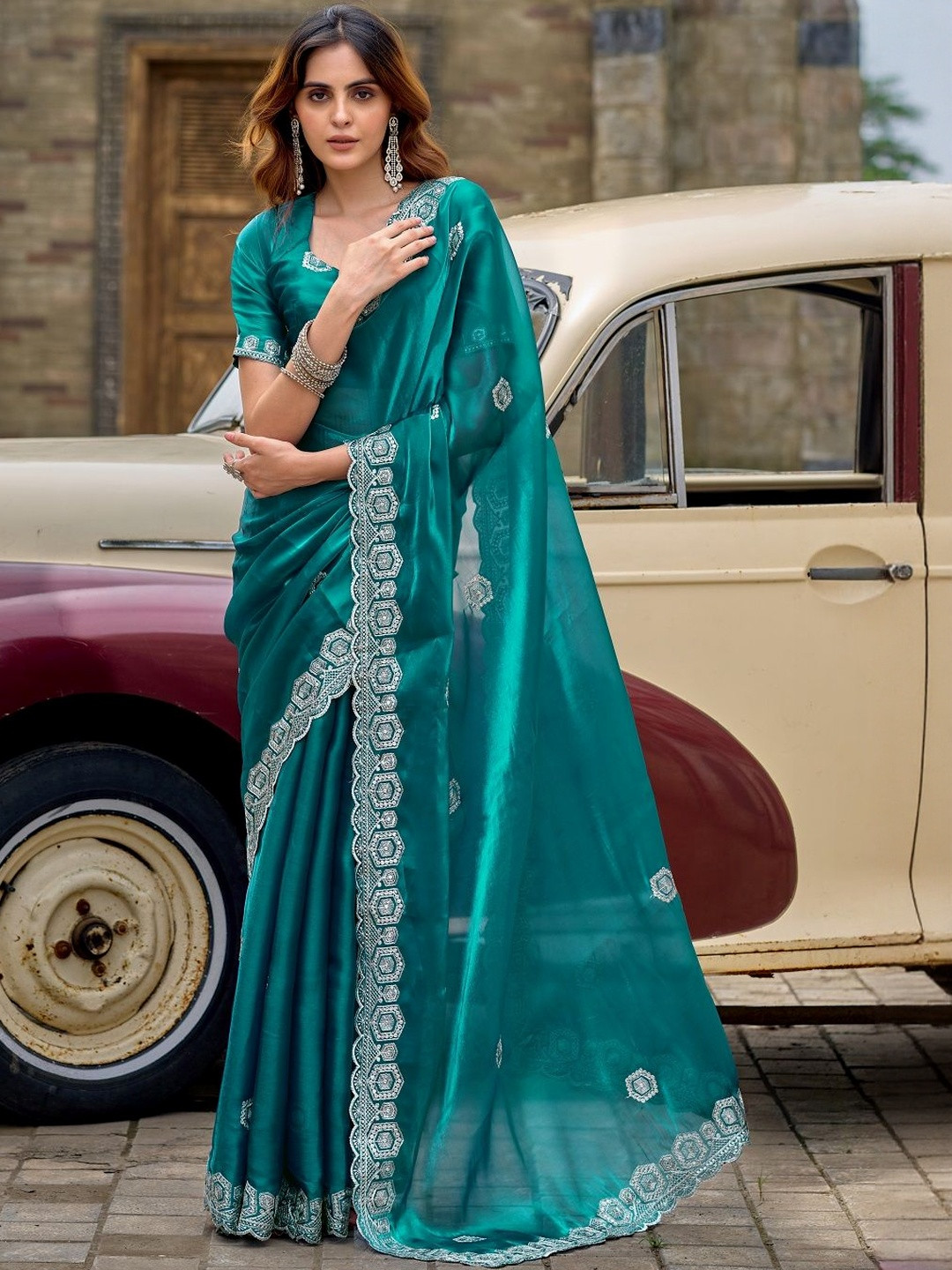 Suha Women Teal Green Elegant shimmer chiffon  Jimmy Cho Saree With Embellished Boarder