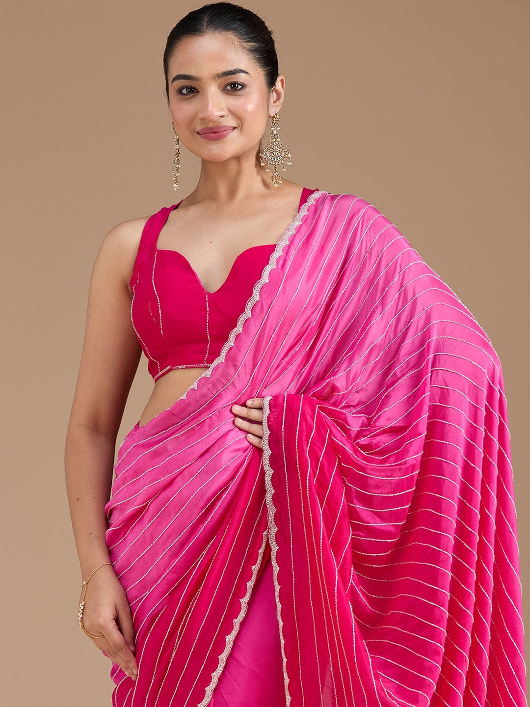 Koskii Rani Pink Cutdana Crepe Saree