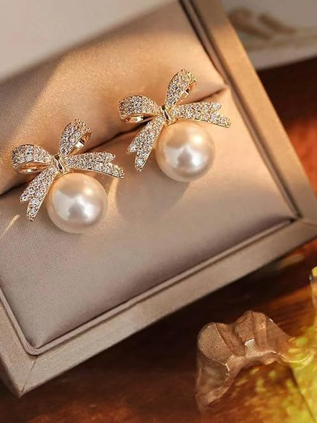 MRIDU ESSENTIALS Women Pearls Bow Stud Earrings