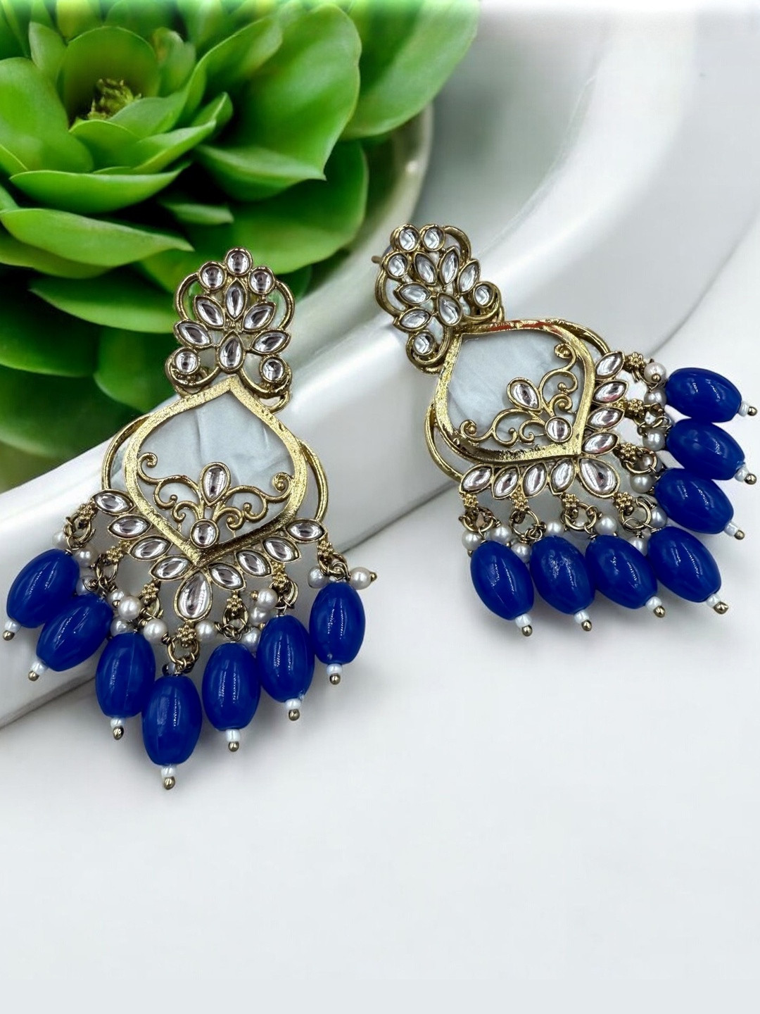 Women Click Gold-Plated Kundan Chandbali earrings