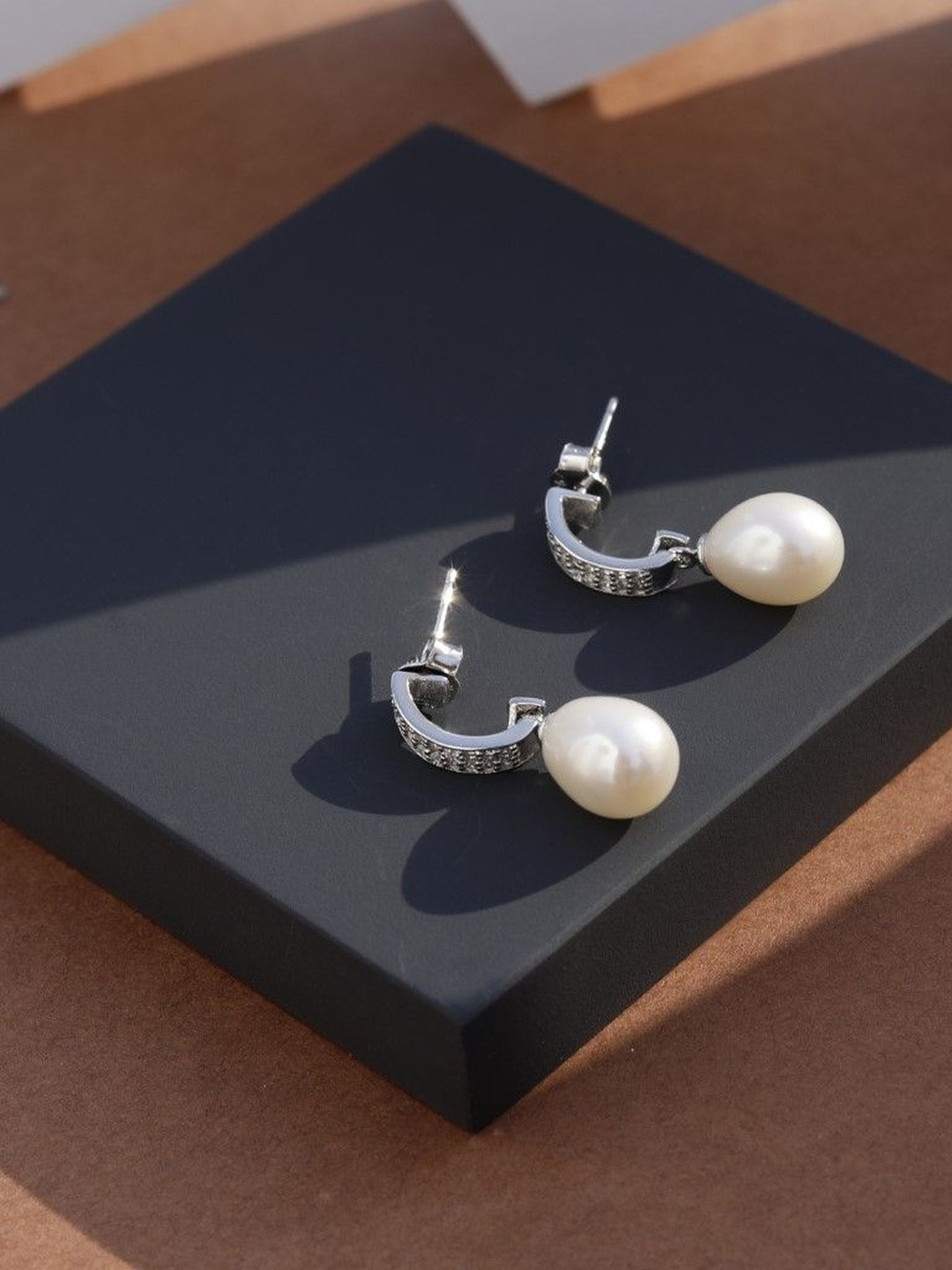 DIAVO  925 Silver Rhodium-Plated Pearls Studded Oval Shaped Half Hoop Earrings