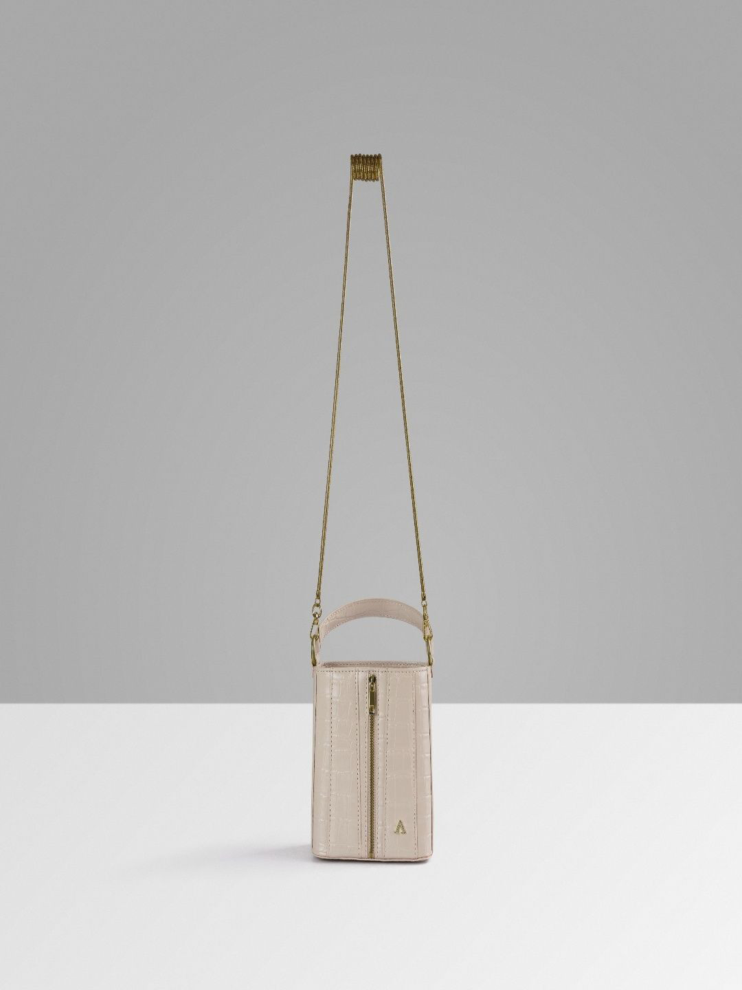 AKINNA Women Textured Half Moon Zip Detail Leather Handheld Bag