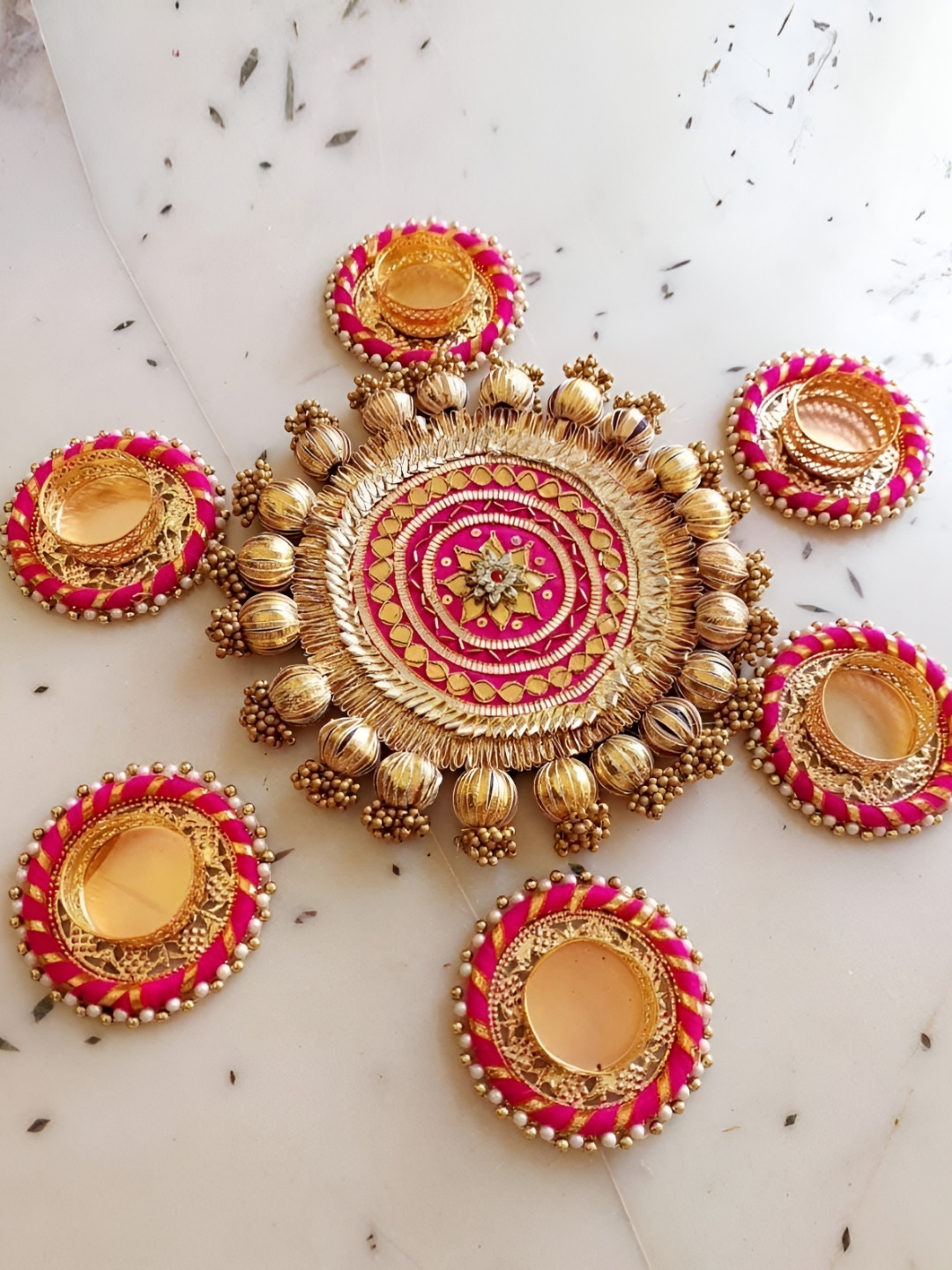 Sellplus Pink & Yellow 7 Pieces Textured Tealight Rangoli Centre Candle Holders