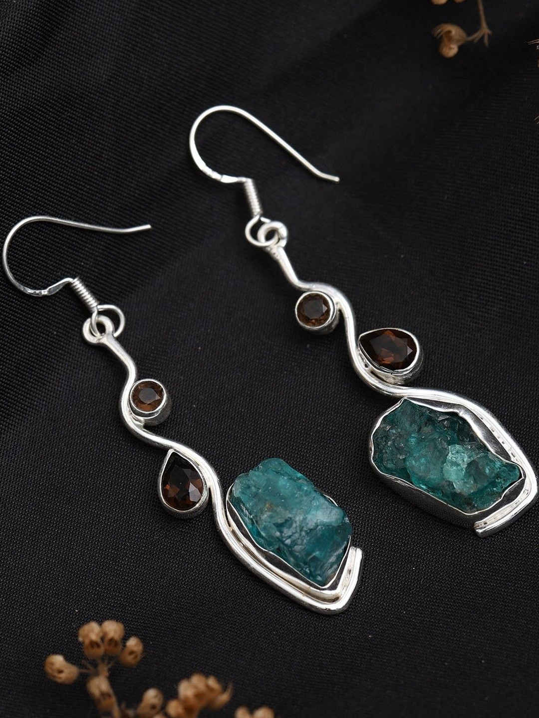 Exotic India Sterling Silver Dangle Earrings with Raw Gemstone