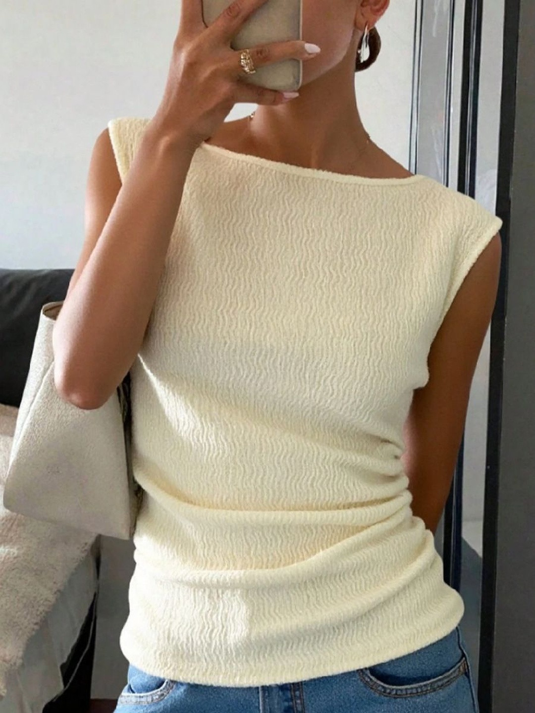 StyleCast Women Cream Sleeveless Solid Top