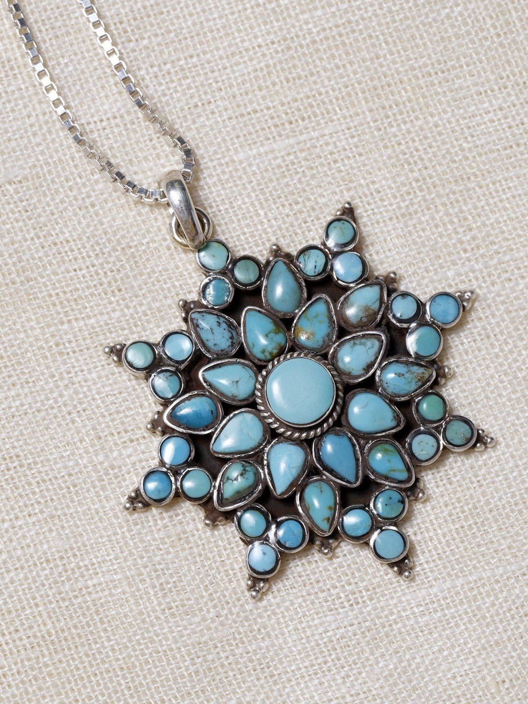 Exotic India Women Sterling Silver Turquoise Stone Pendant