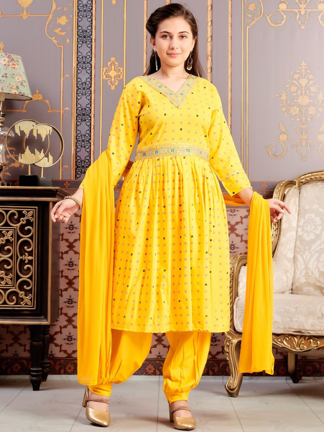 Muhuratam Girls Ethnic Wear Yellow Colour Foil Print Embroidery Rayon Kurti