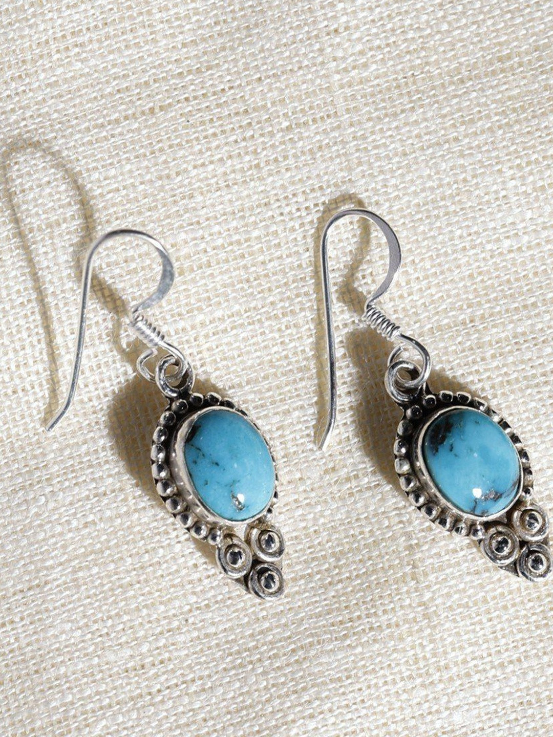 Exotic India Sterling Silver Turquoise Oval Drop Earrings