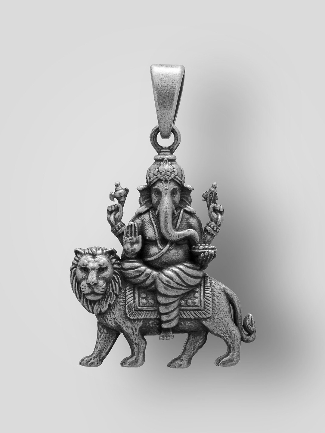 Exotic India Unisex Sterling Silver Lord Ganesha Seated On Lion Pendant