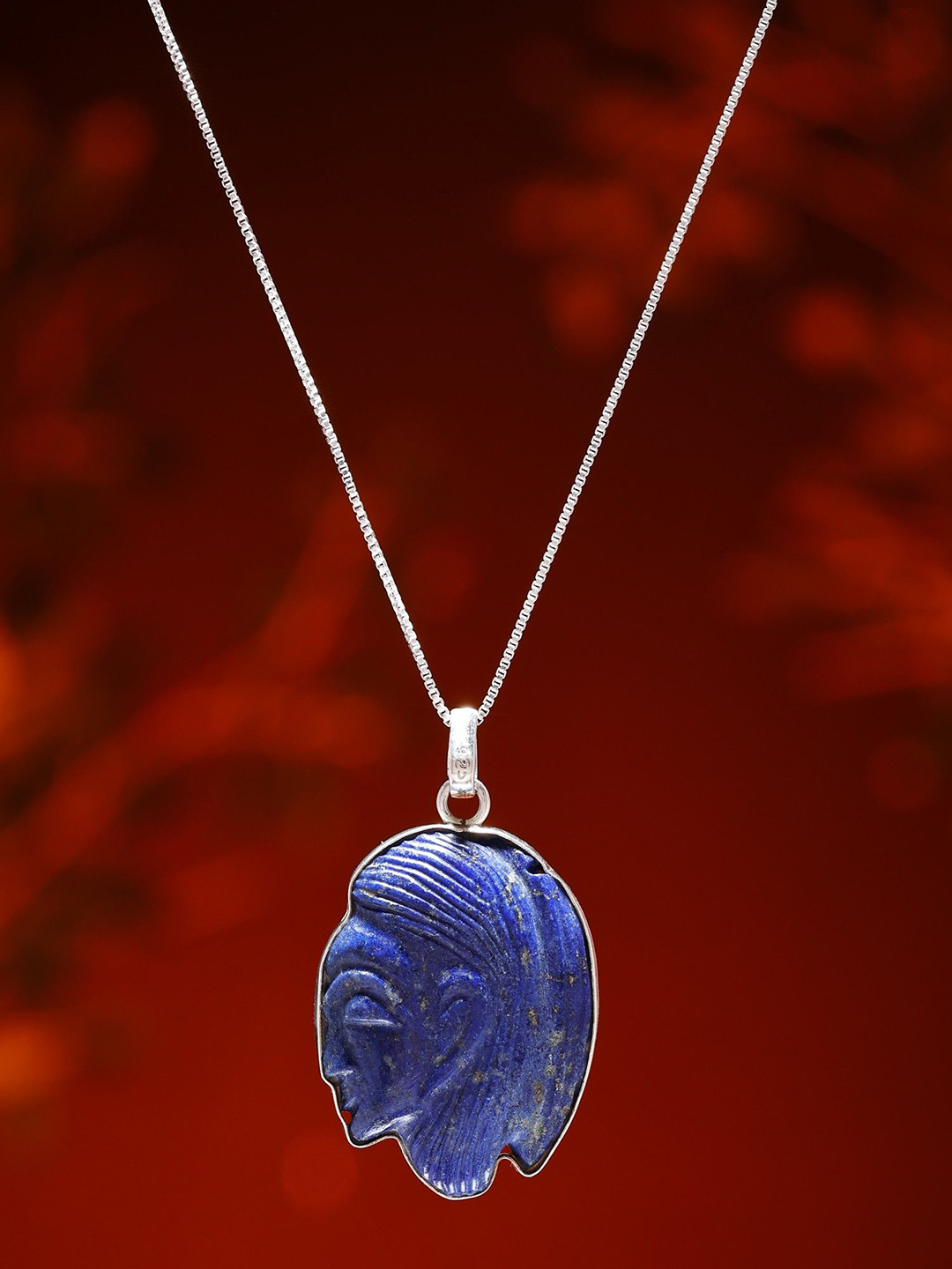 Exotic India Sterling Silver Human Side Face Carved Lapis Lazuli Pendant