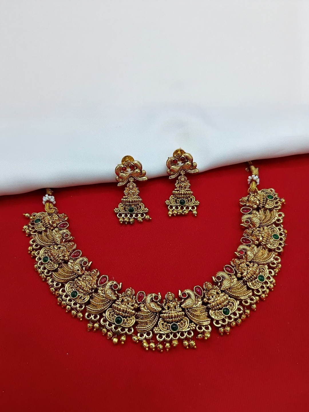PADMAWATI BANGLES PVT LDT Gold-Plated Stones Studded & Beaded Temple Necklace & Earrings
