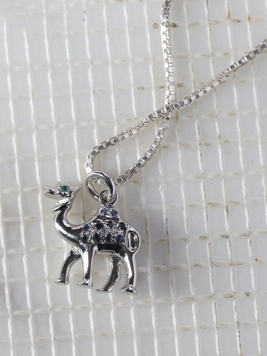 Exotic India Women Sterling Silver Emerald and Sapphire Gemstone Camel Pendant