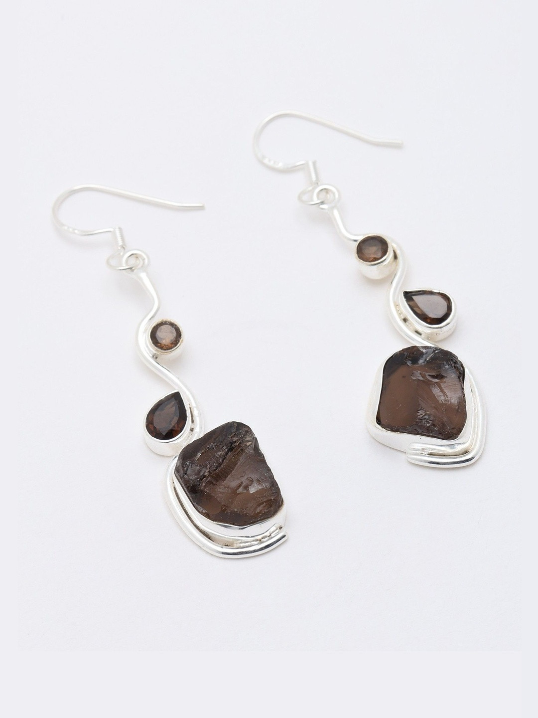 Exotic India Contemporary Sterling Silver Dangle Drop Earrings with Raw Gemstone