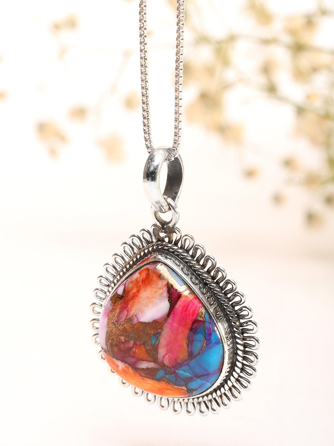 Exotic India Women Sterling Silver PearShaped Turquoise Pendant in Silver Wire Loop Design