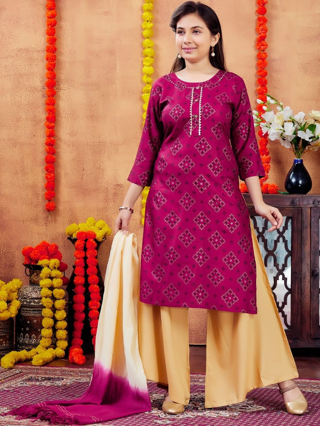 Muhuratam Girls Party Wear Maroon Colour Printed Cotton Kurti