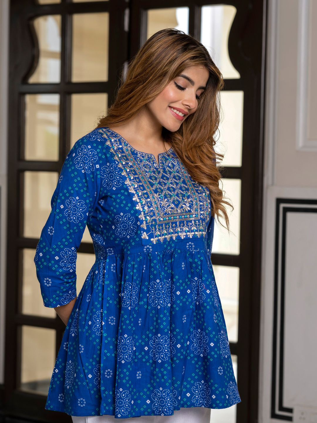 KALINI Women Printed Embroidered Cotton Peplum Top