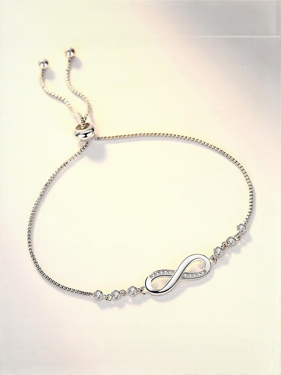 DressBerry Women Silver Plated American Diamond Slip-On Bracelet
