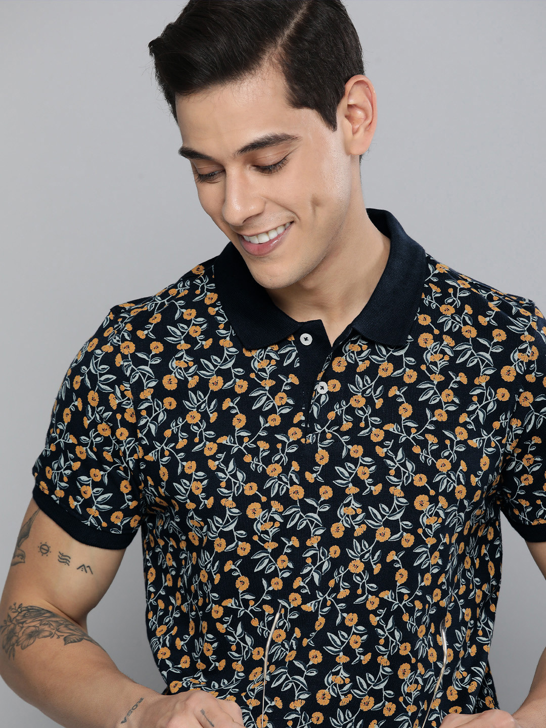 Mast & Harbour Men Navy Blue & Mustard Yellow Floral Printed Polo Collar Cotton T-shirt