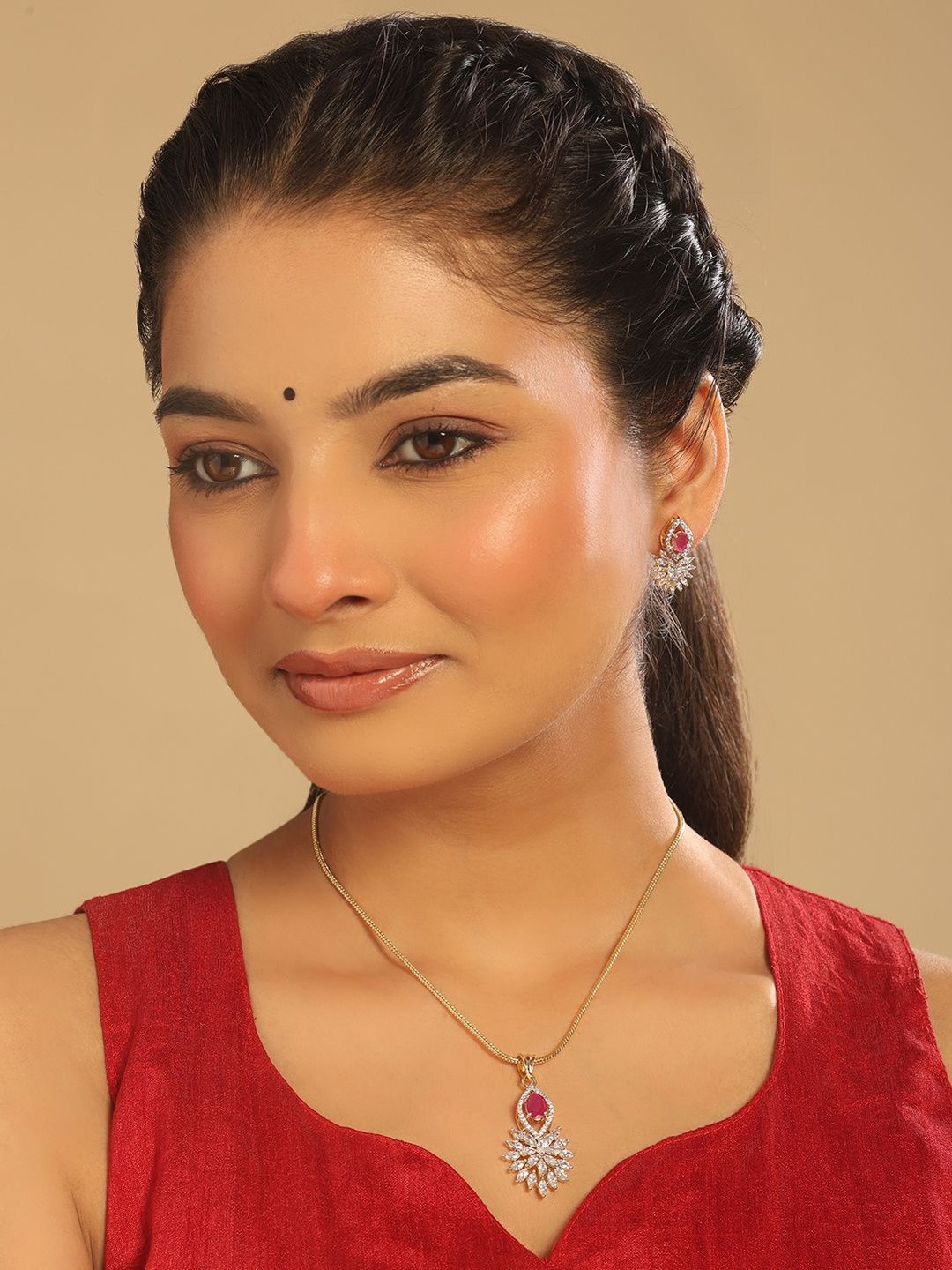 Nuyug Gold-Plated American Diamond Studded Pendent With Earrings