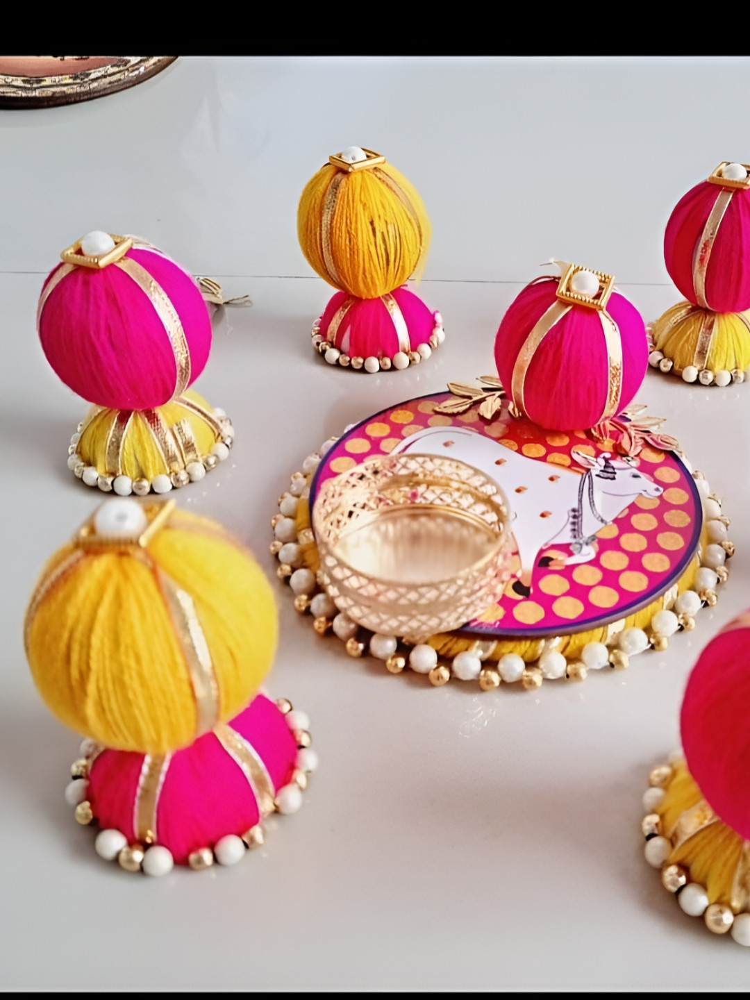 Sellplus Yellow & Pink Jhumki Gota Ball With Moti Chudi Cow Candle Holder