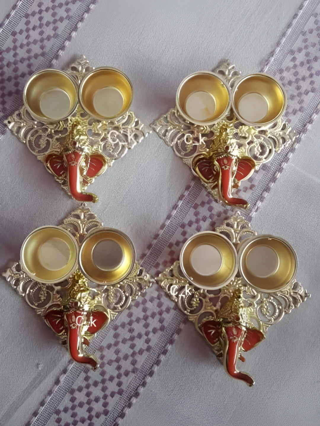 Sellplus Red & White 4 Pieces Ganesh Jii Kumkum Chawal Platter Candle Holders