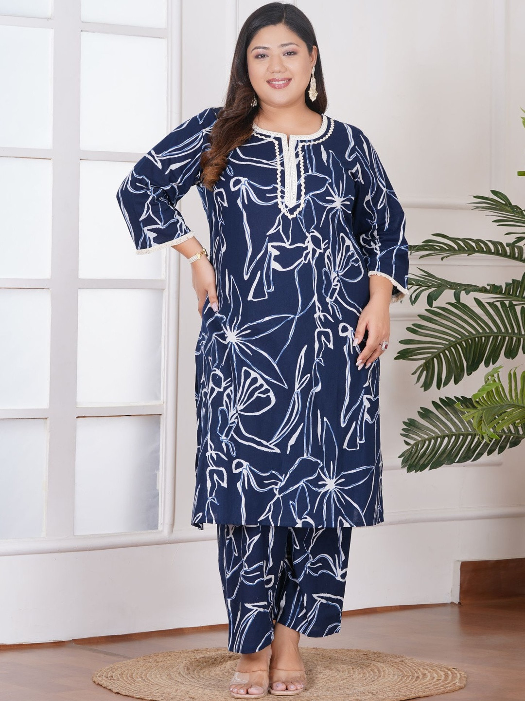 Bani Women Plus Size Blue Abstract Printed Cotton Kurta & Pant Set with Lace Detailing