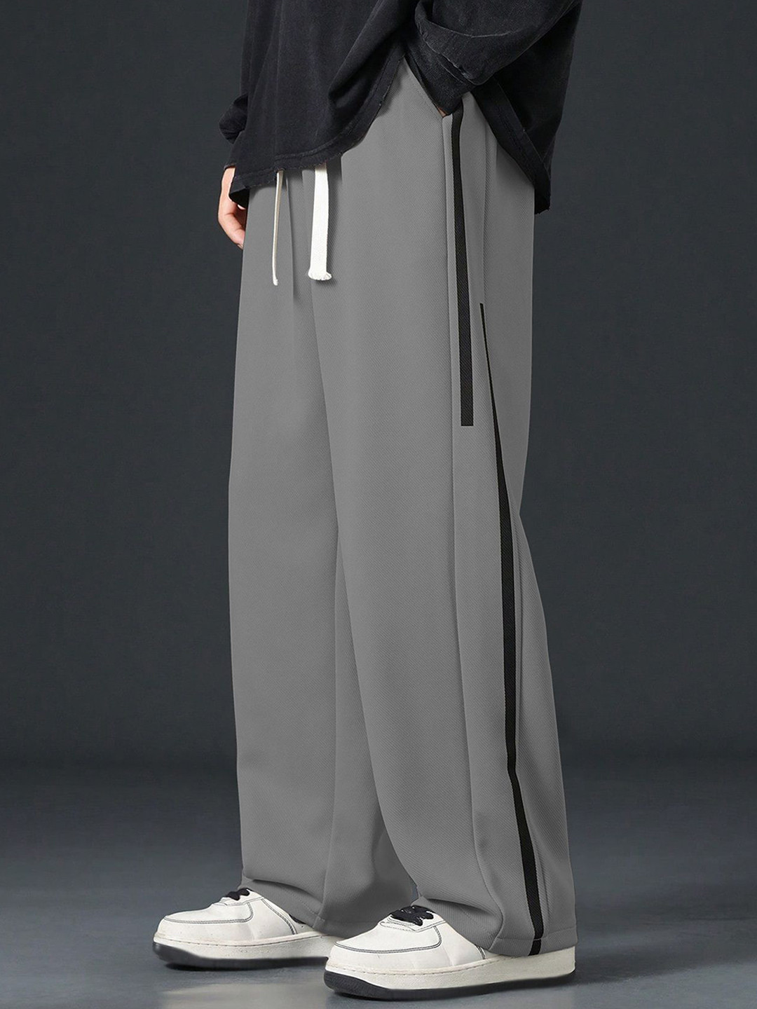 KAJARU Men Textured Loose Fit Mid-Rise Stain Resistant Trousers