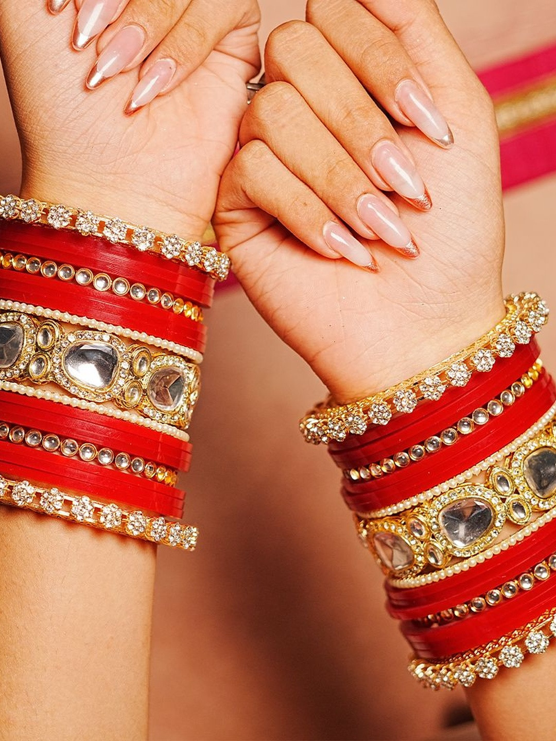 THE GOLDEN CASCADE Set Of 34 Artificial Stones Studded Bangles