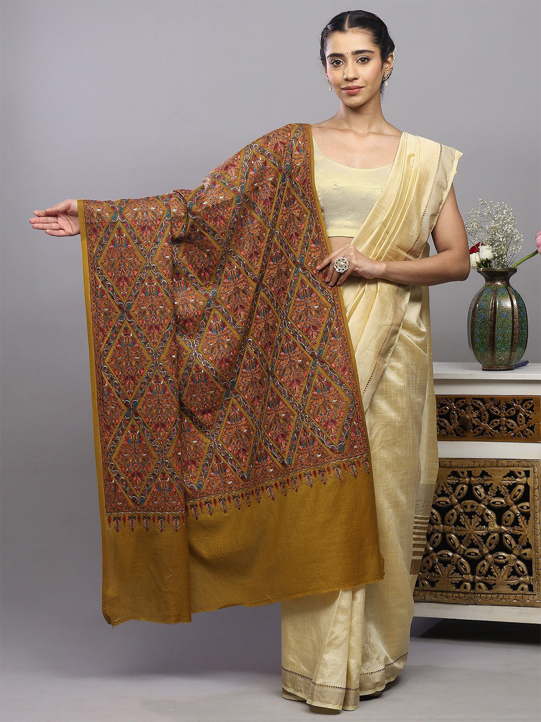 Exotic India Flowers In Diamond Pattern Embroidered Woollen Shawl