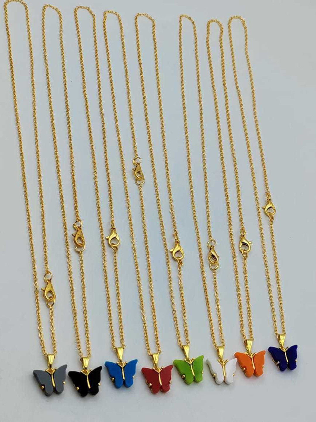 OM KRISHIV COLLECTION Set Of 8 Gold-Plated Butterfly Shaped Pendants With Chains