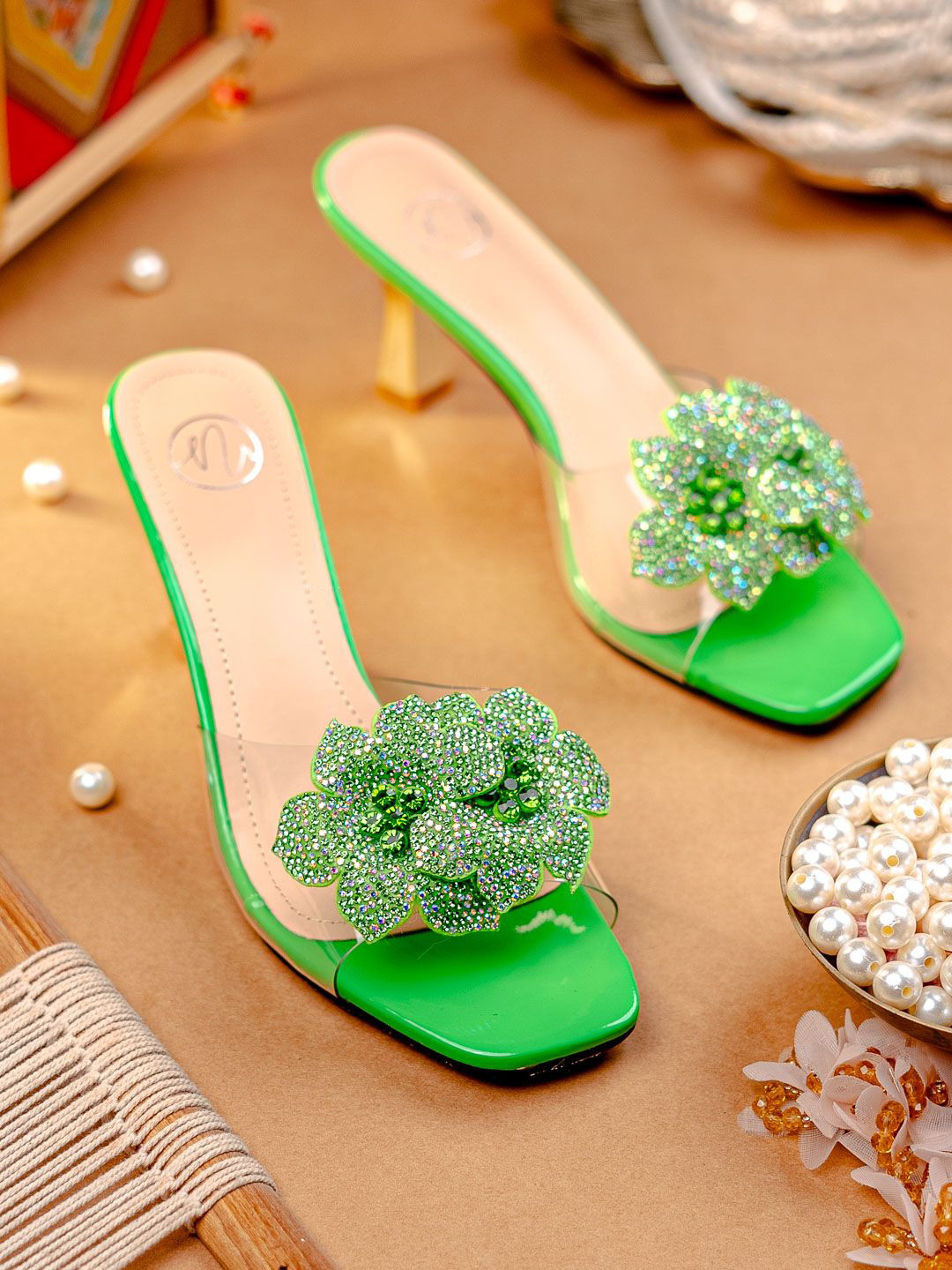 NR By Nidhi Rathi Green Stiletto Heels With Transparent Upper & Diamond Floral Detailing
