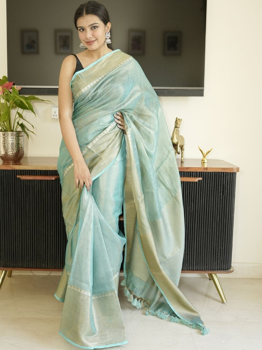 Uttaraa Woven Design Tissue Linen Saree With Blouse
