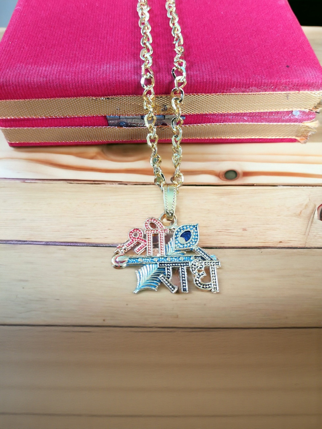 Basukiya Unisex Golden Shri Radhe Locket Artificial Stones Chain.