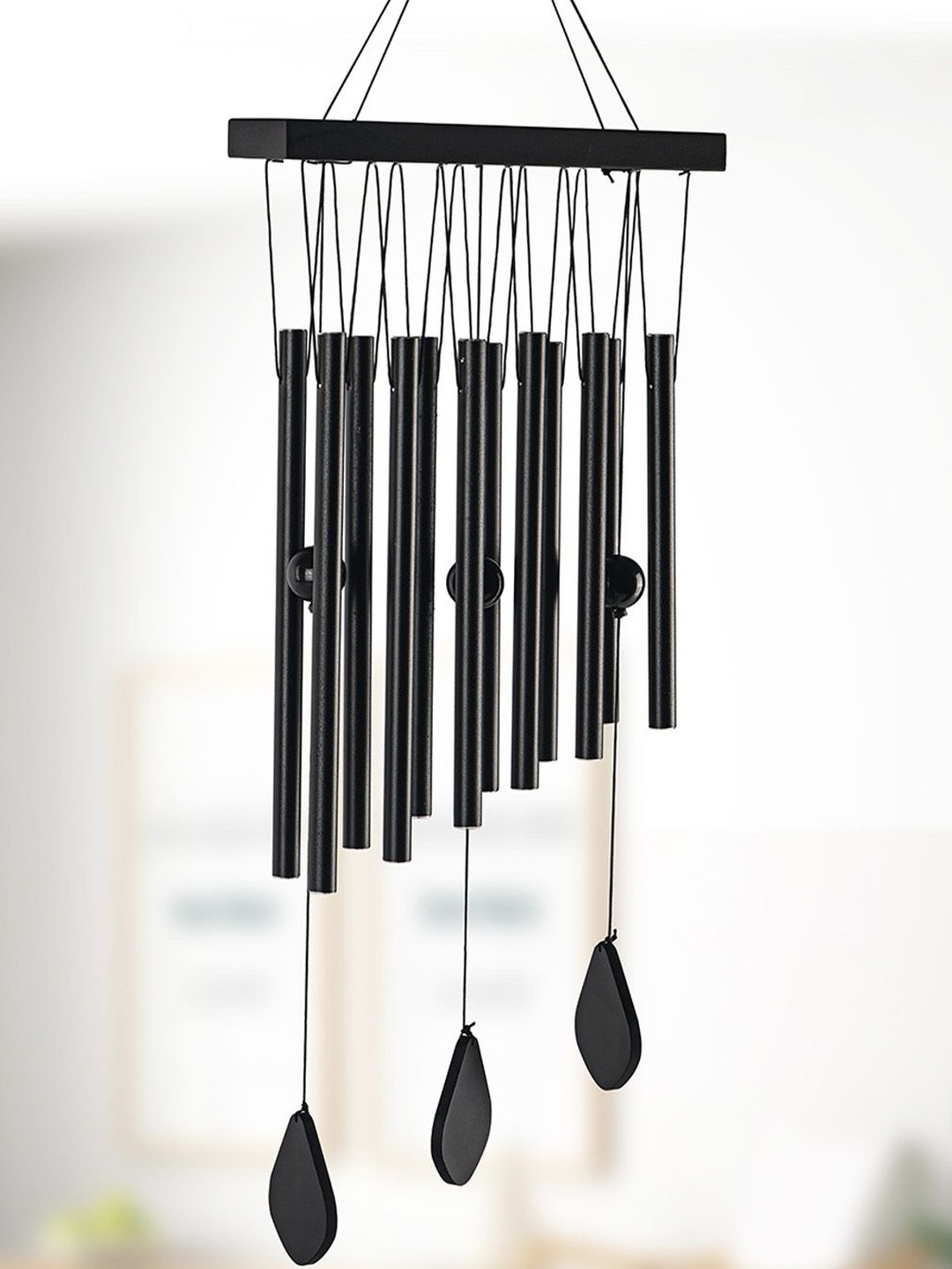 Myntra Elegant Homes Black 12 Tubes Musical Aluminum Wind Chimes