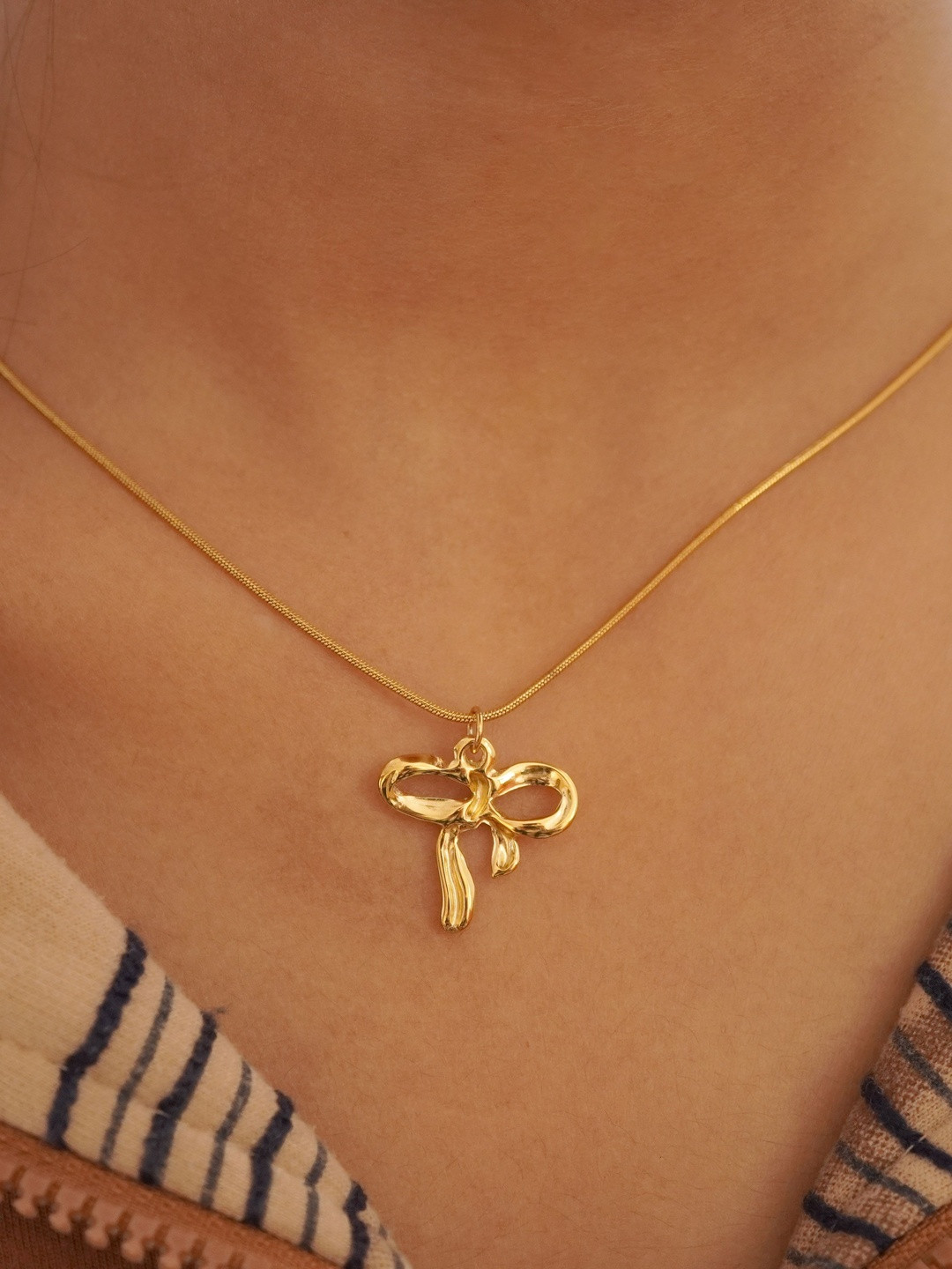 INTERSTELLAR Women Gold-Plated Bow Pendant With Chain