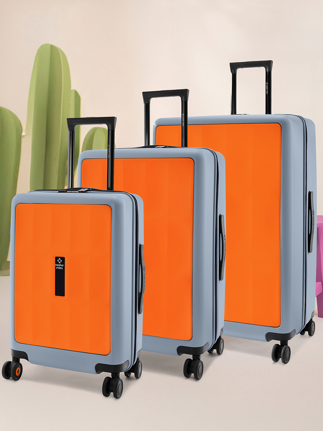 Nasher Miles Zanzibar Polycarbonate Set of 3 S/M/L Orange Grey Trolley Bags (55-65-75 cm)