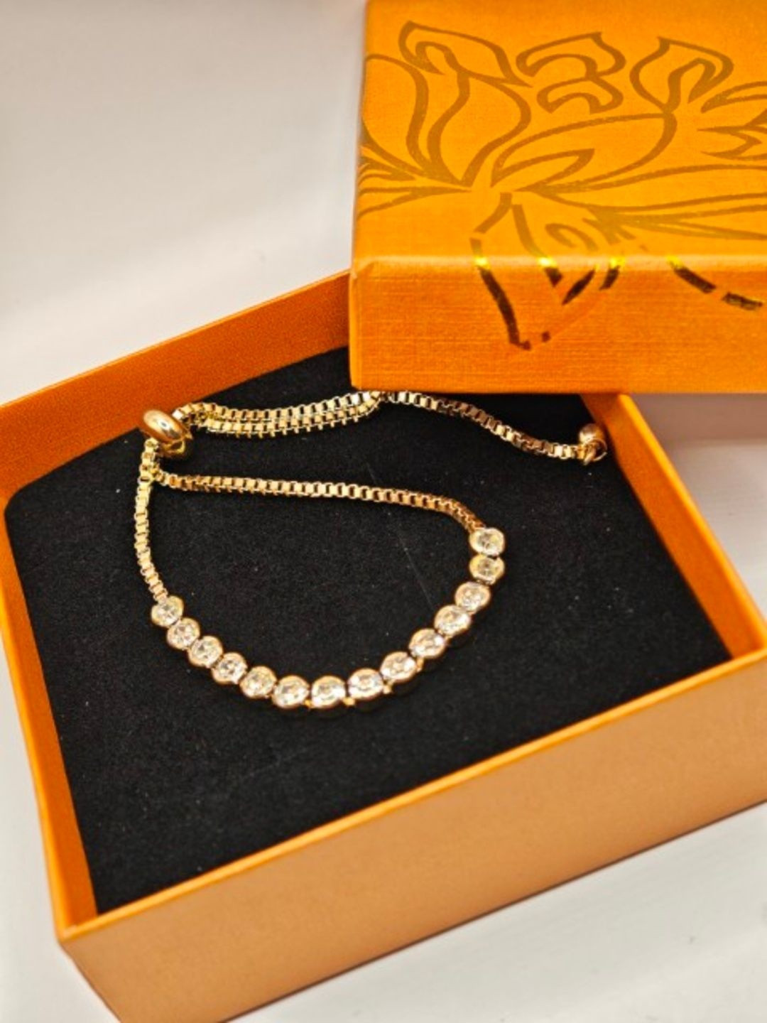 SAPRAA TRENDS Women Gold-Plated American Diamond Adjustable Bracelet