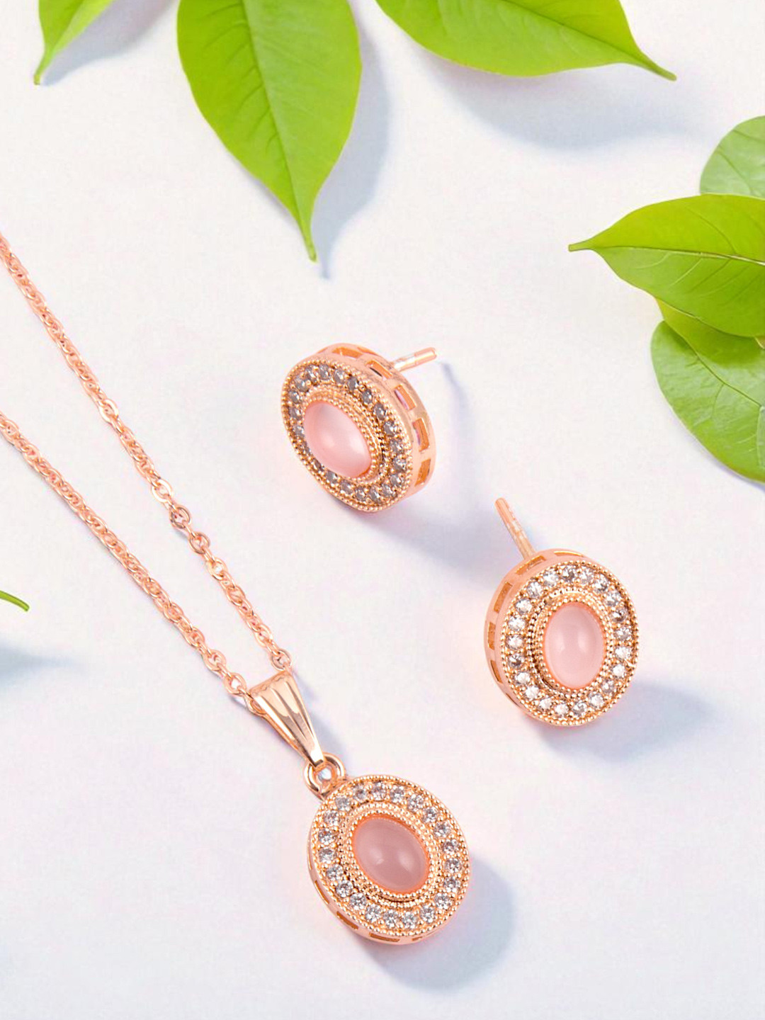 Kord Store Rose Gold Plated American Diamond Studded Oval Shape Pendant Set