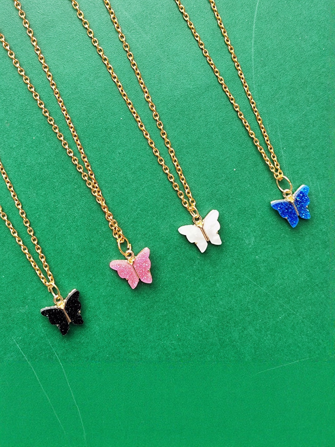 Amit Fashion Set Of 4 Butterfly Shaped Enamelled Pendants