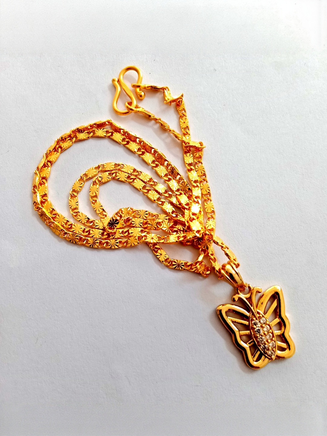 Nawab Collection Gold-Plated Artificial Stones Studded Animal Shaped Pendant With Chain