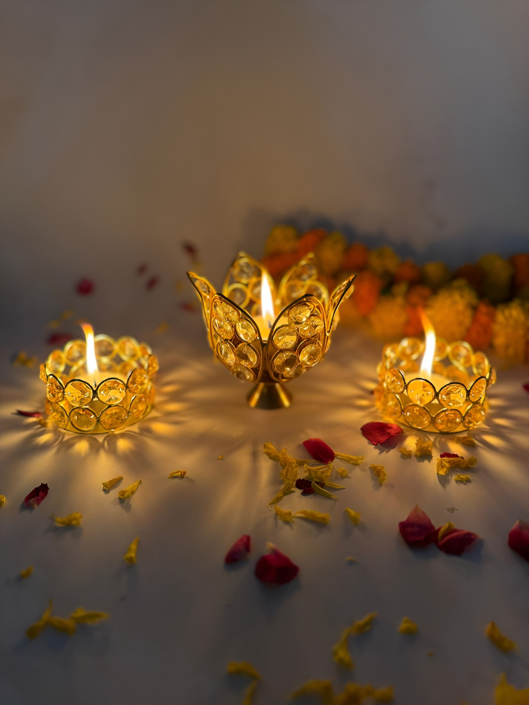 Giftii Gold Toned & White 3 Pieces Lotus Embellished Crystal Tea-Light Candle Holders