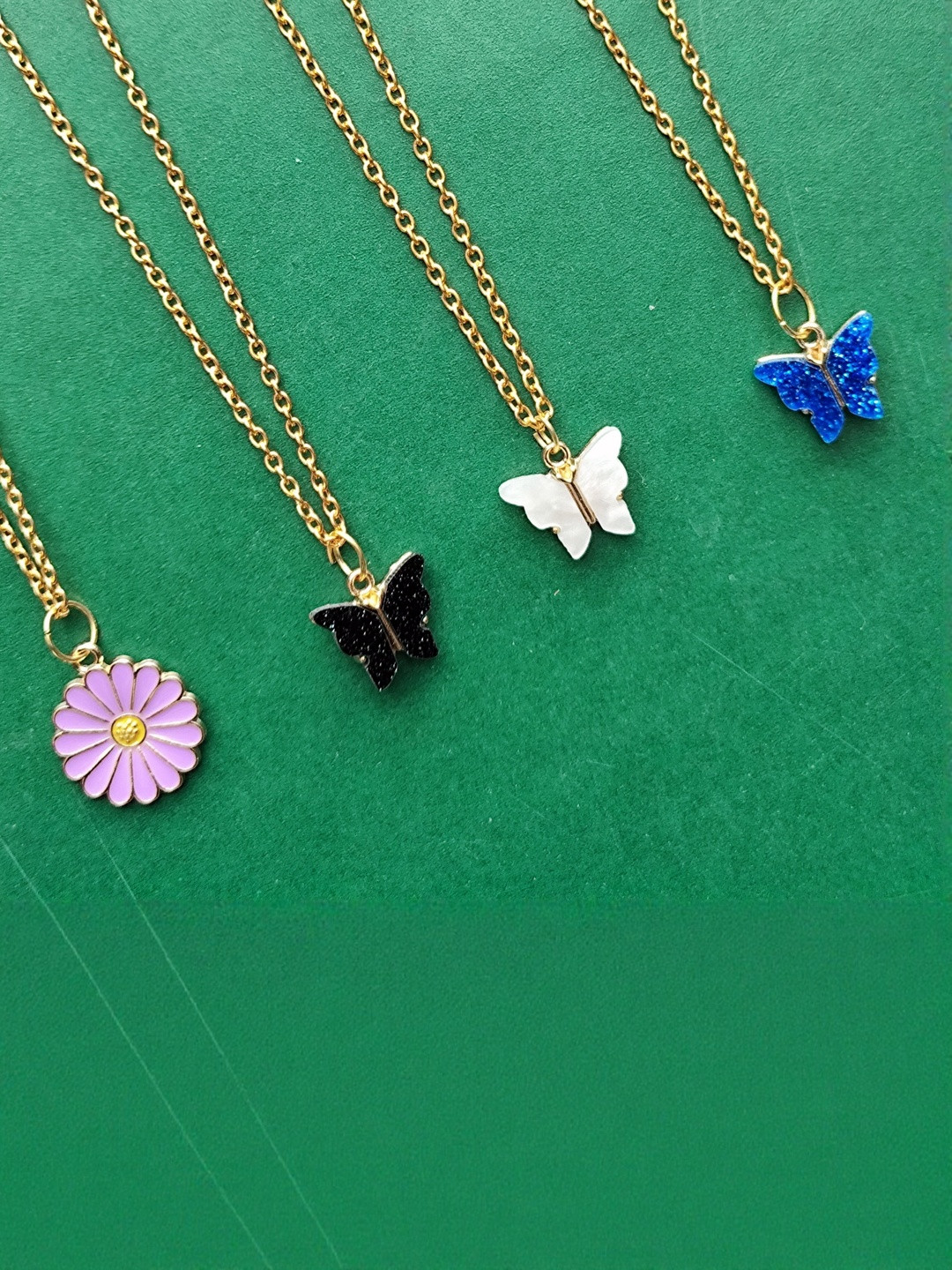 Amit Fashion Set Of 4 Floral Pendants With Chains