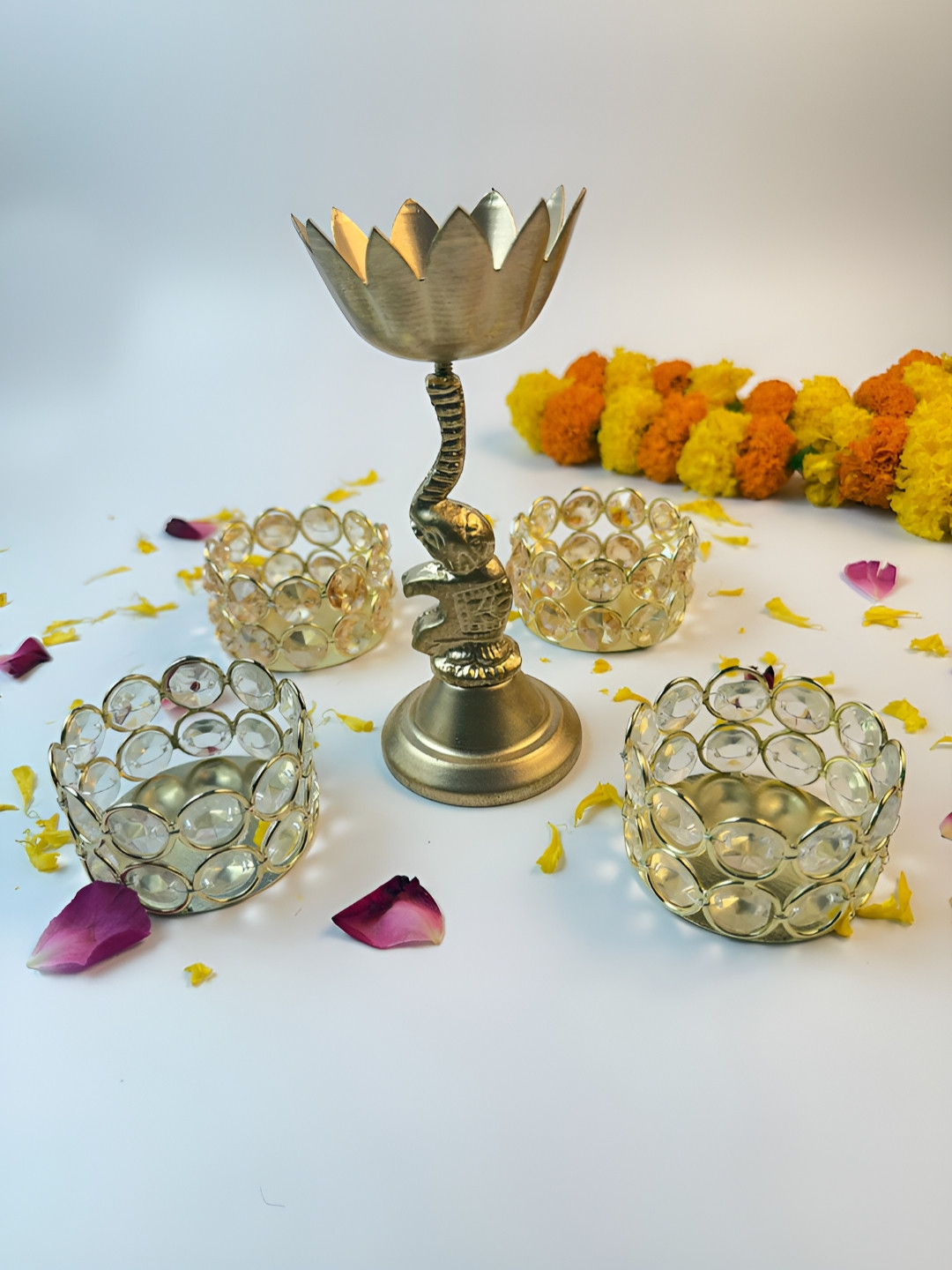 Giftii Gold Toned & White 5 Pieces Elephant Lotus Embellished Tea-Light Candle Holders