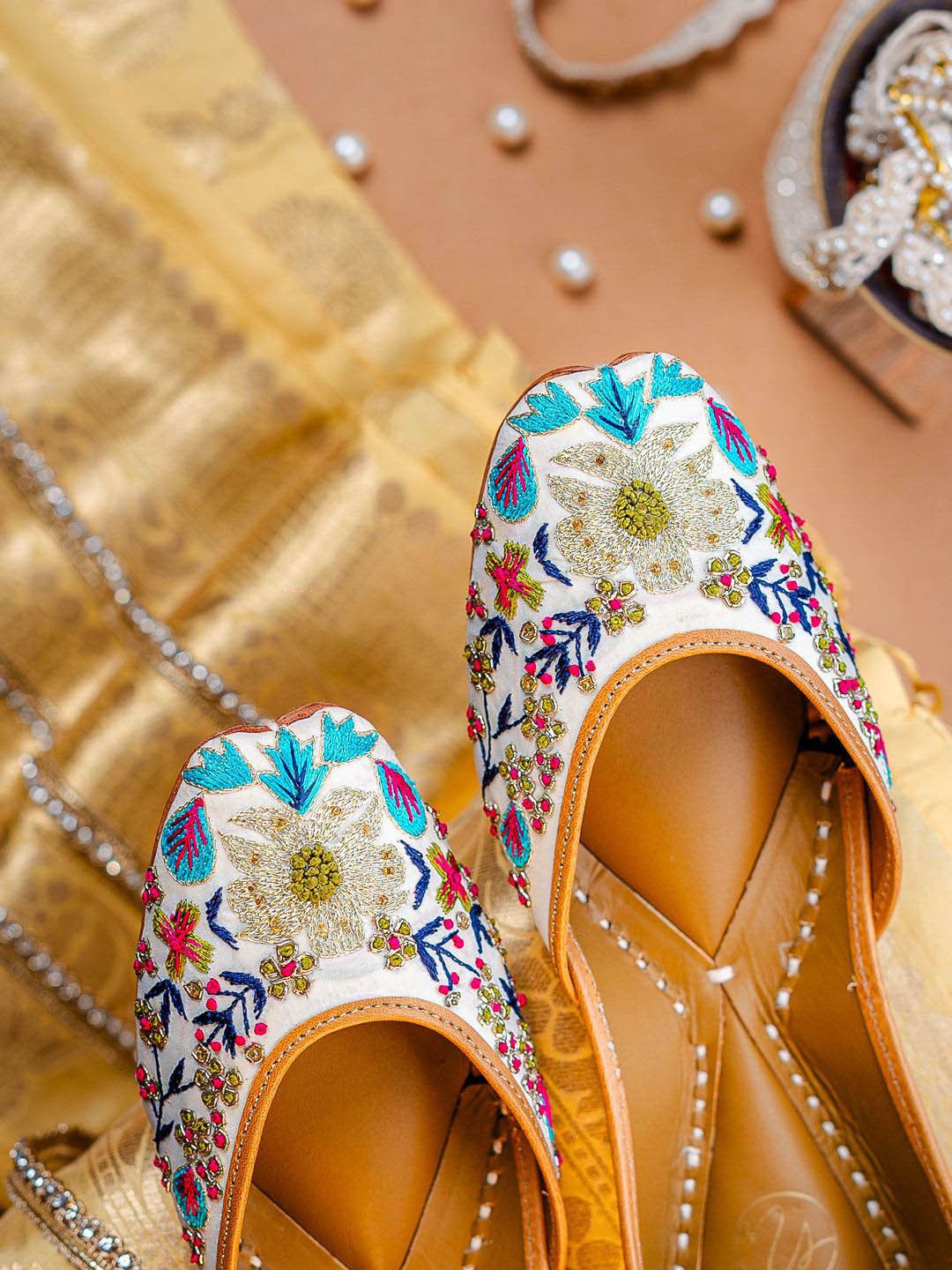 NR By Nidhi Rathi Women White Handcrafted Multicolored Embroidered Ethnic Juttis